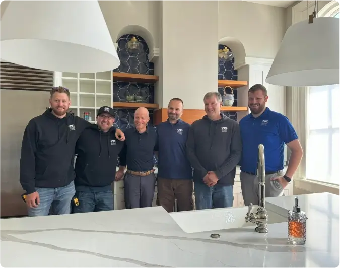 group of workers from WPM all together smiling